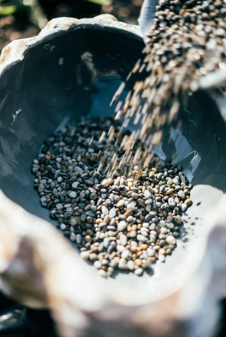 Clean washed gravel being poured from a container